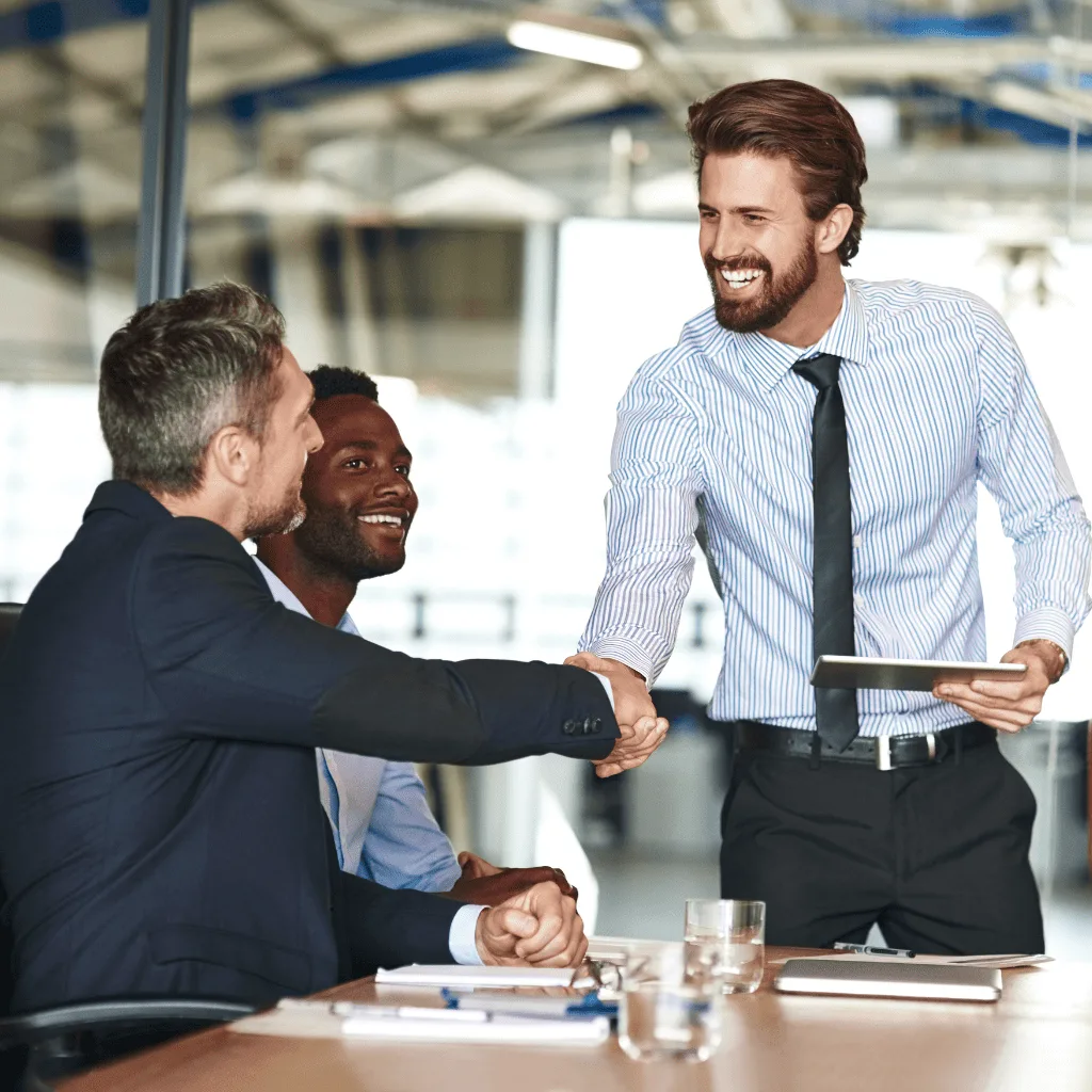 Calley team members shaking hands